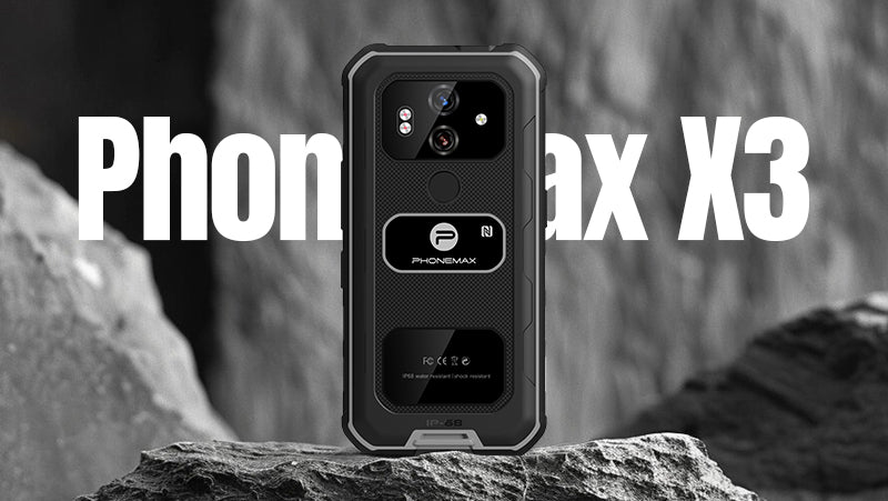 Black Phonemax X3 rugged smartphone displayed upright on a rocky monochrome background