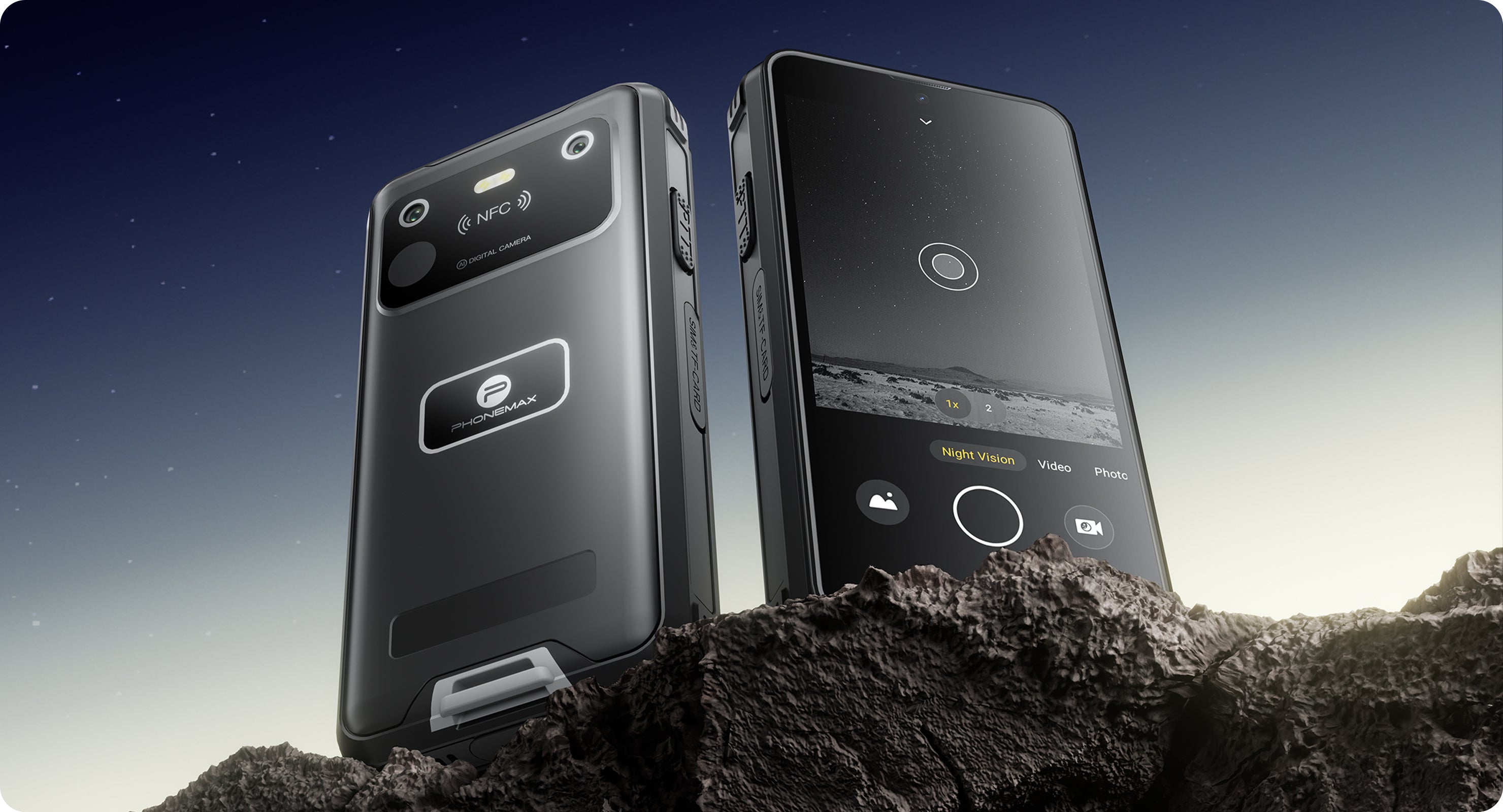 Two black Phonemax R4 GT rugged phones displayed upright on rocky terrain