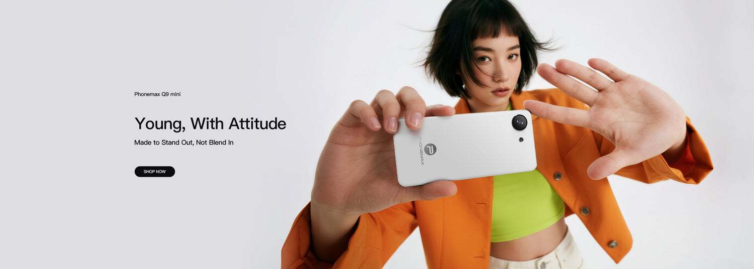 Woman holding a white Phonemax Q9 Mini compact smartphone horizontally for a photo