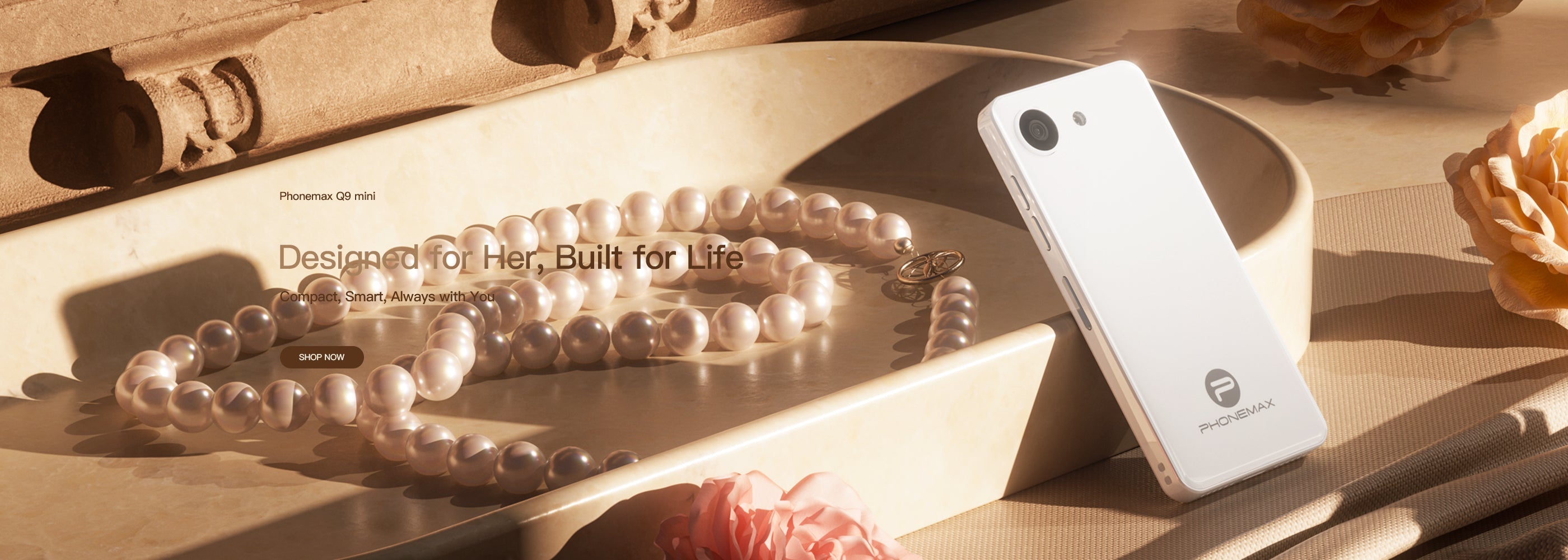 White Phonemax Q9 Mini phones displayed in slim side-profile views on a beige background