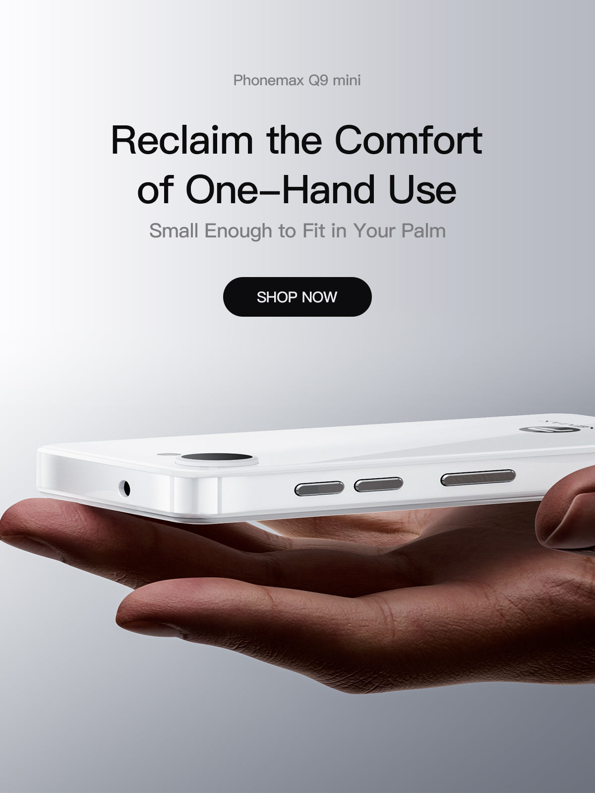 White Phonemax Q9 Mini balanced on a hand to show its slim body, ports and buttons