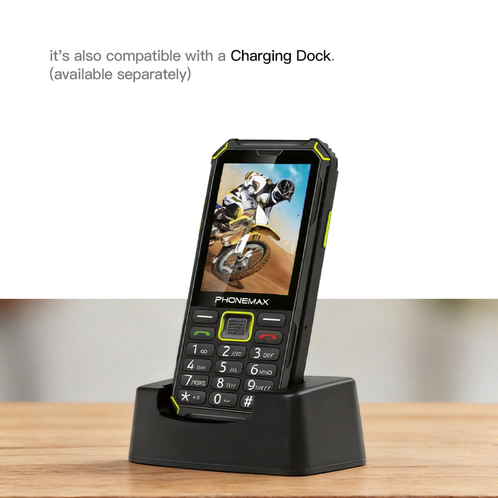 Phonemax F4 T rugged keypad phone standing in a desktop charging dock