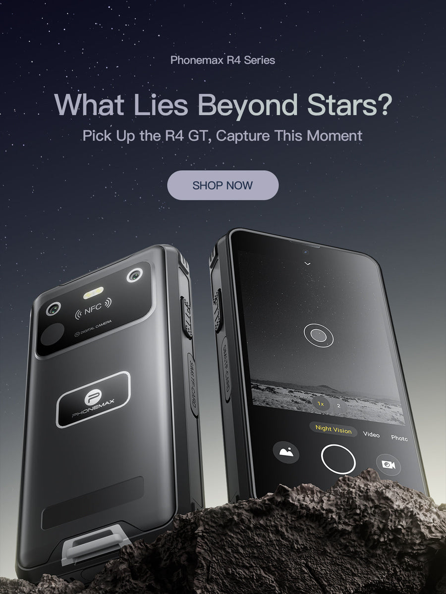 Two black Phonemax R4 GT rugged phones standing on rocky terrain beneath a starry sky
