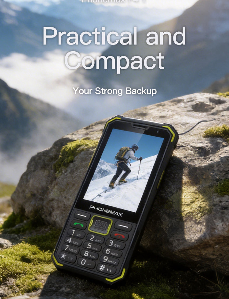 Phonemax F4 T rugged keypad phone on mountain rocks with a skiing image on its screen