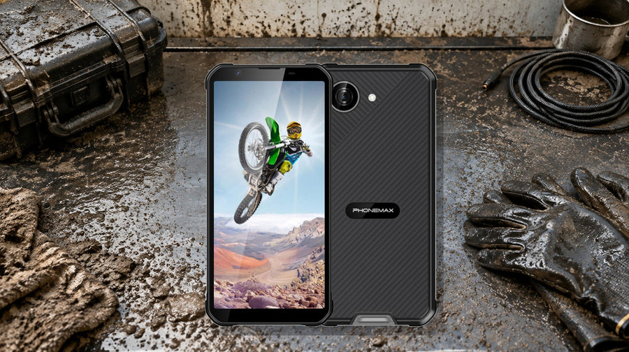 Phonemax X5 rugged phone on a muddy and dusty harsh-environment inspection bench