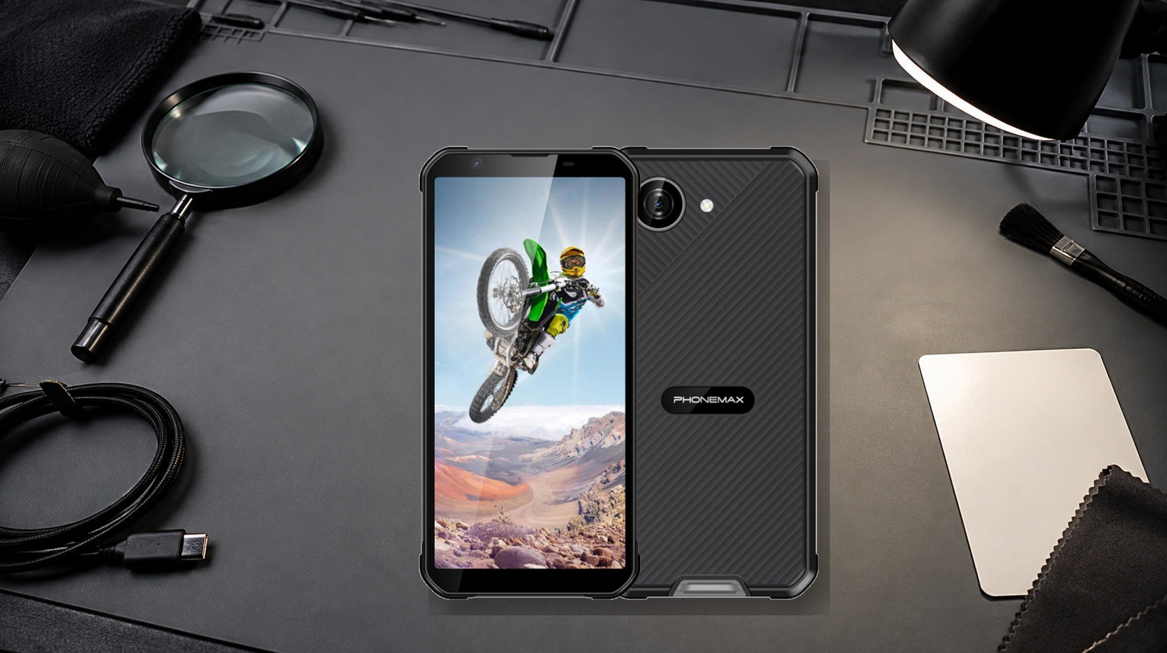 Used rugged phone undergoing an inspection of ports, seals and device identity